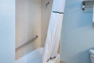 Morro Shores Inn Guest Rooms - Bathrooms Feature Full Bath Shower Tubs